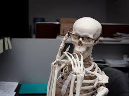  Skeletion setting on the phone with glasses on